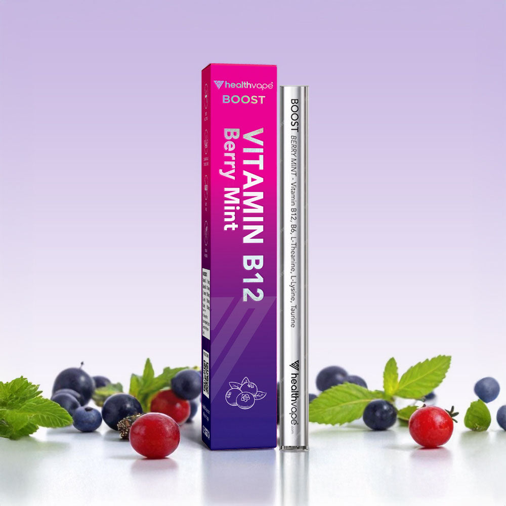 HealthVape BOOST Vitamin B12 Berry Mint product with packaging and berries on a light purple background