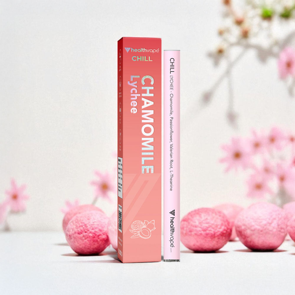 HealthVape CHILL Lychee disposable inhaler with matching pink packaging, labeled with calming botanicals.