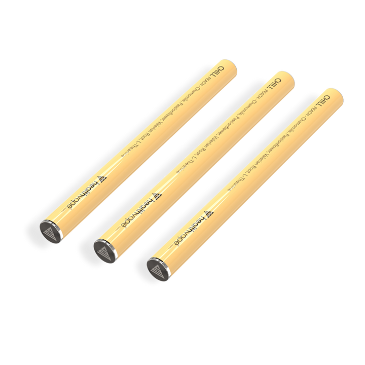 Three yellow HealthVape Chill Chamomile Peach disposable pens side by side