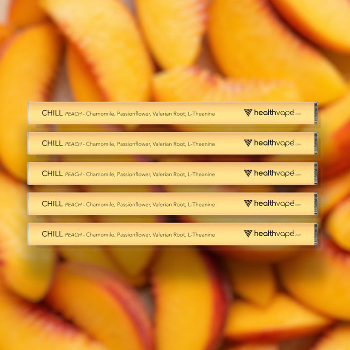 Five HealthVape CHILL Peach chamomile pens stacked on peach background
