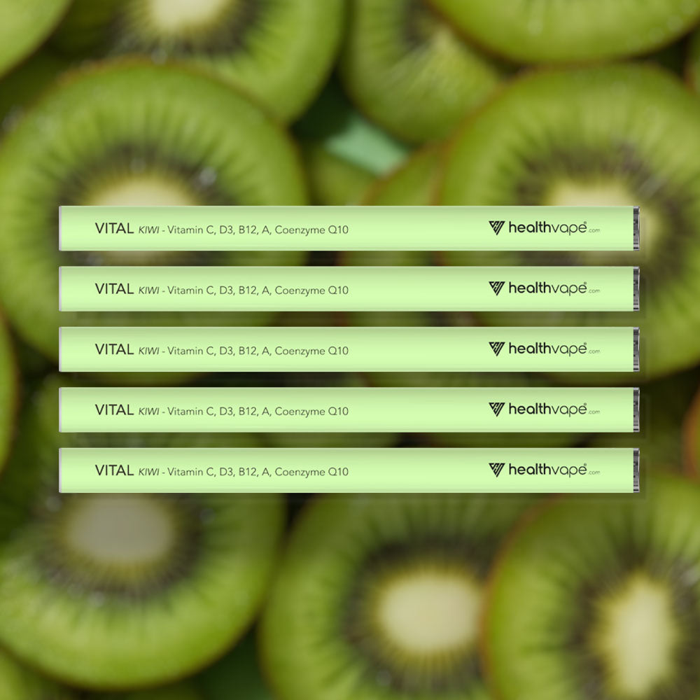 Five HealthVape VITAL Kiwi Vitamin C pens stacked on kiwi background