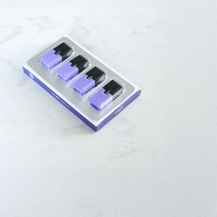 Pack of four purple and black HealthVape pods in blister tray on white surface