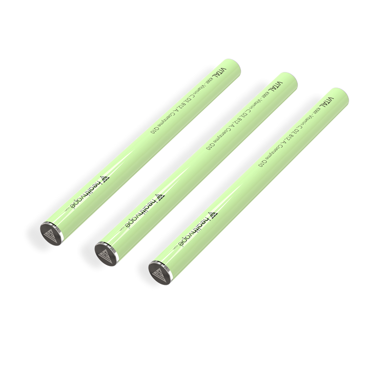 Three HealthVape Vital Vitamin C Kiwi disposable pens aligned on transparent background